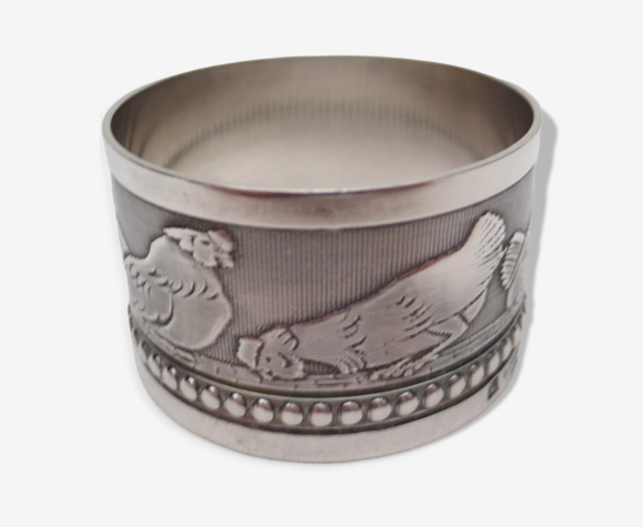 Rond de serviette en plaqué argent de marque, décor canettons