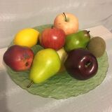 Glass cup and dummy fruit