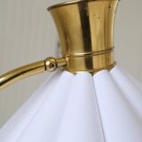 Curved mid-century floor lamp in brass and stone