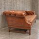 Chesterfield sofa / Brown cognac leather / Deep buttoned / 1980s
