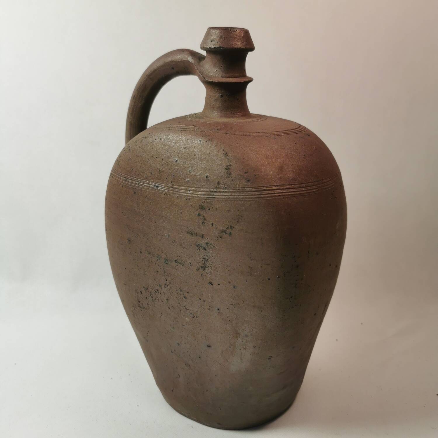 Norman jug bottle with old sandstone handle