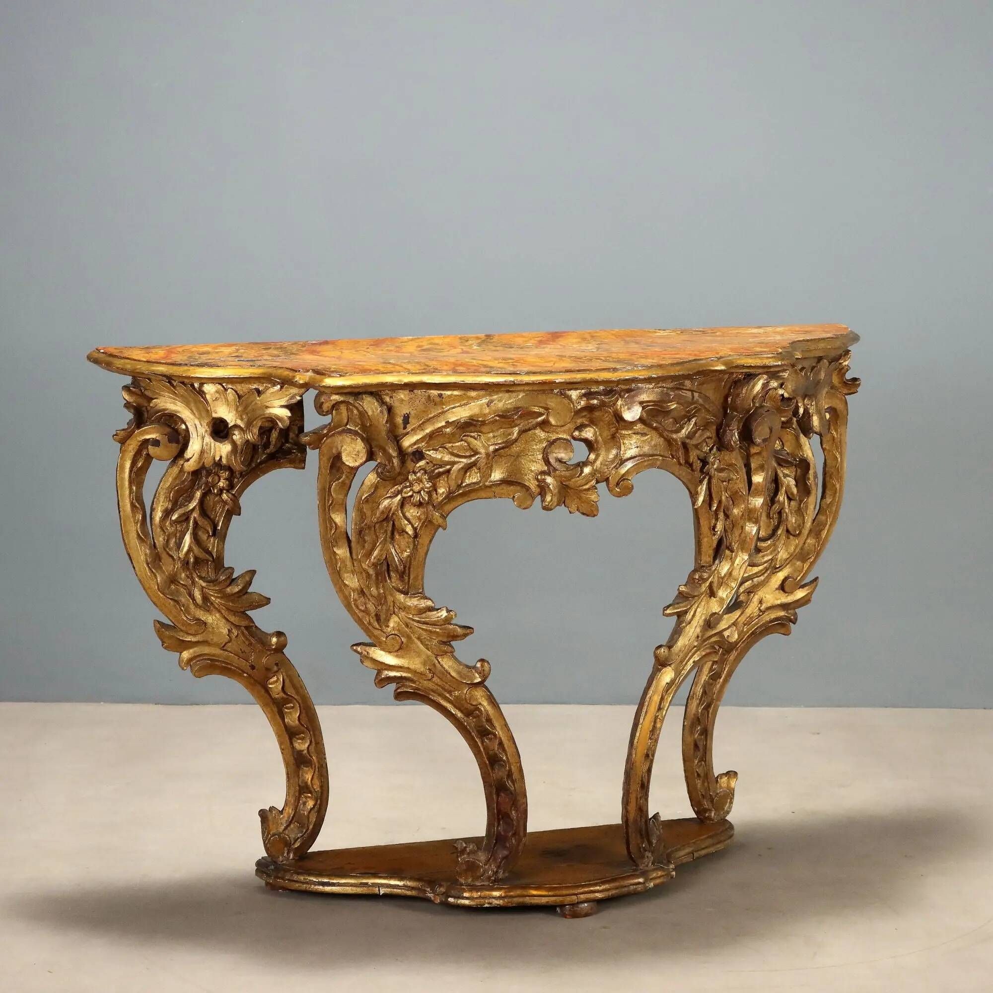 Old eclectic console carved in gilded fir, Italy 19th century