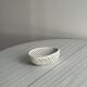 Small twisted porcelain bowl