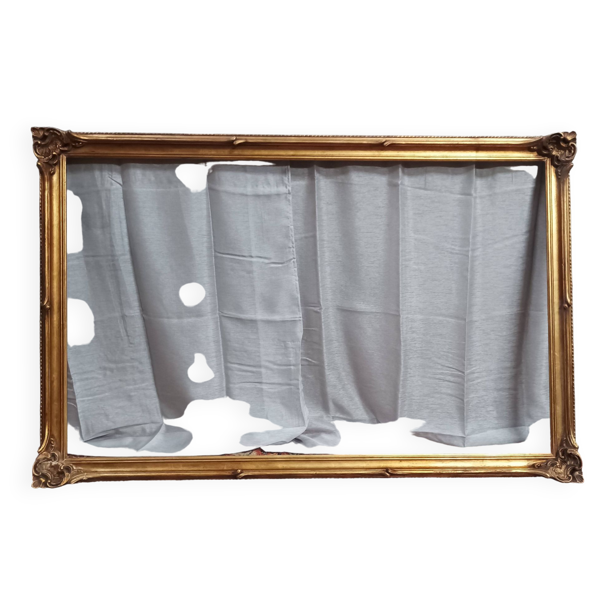 Old frame in wood and gilded stucco