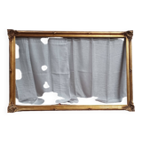 Old frame in wood and gilded stucco