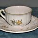 Two MOUSTIER cups decorated with flowers signed