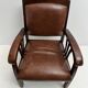 Colonial armchair in teak and leather