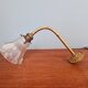 Bronze wall light with grooved clear glass, early 20th century