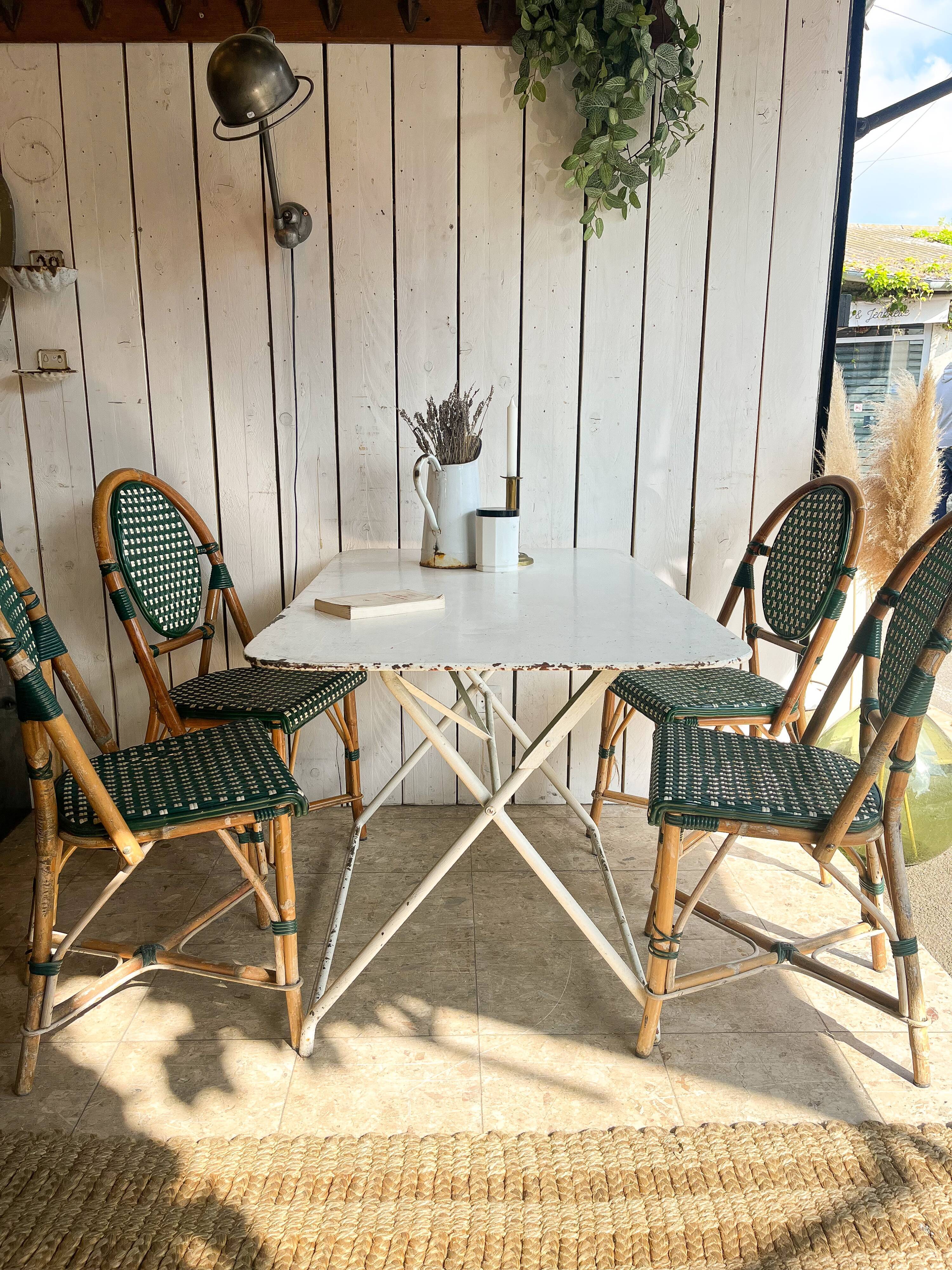 White folding metal bistro table