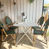 White folding metal bistro table
