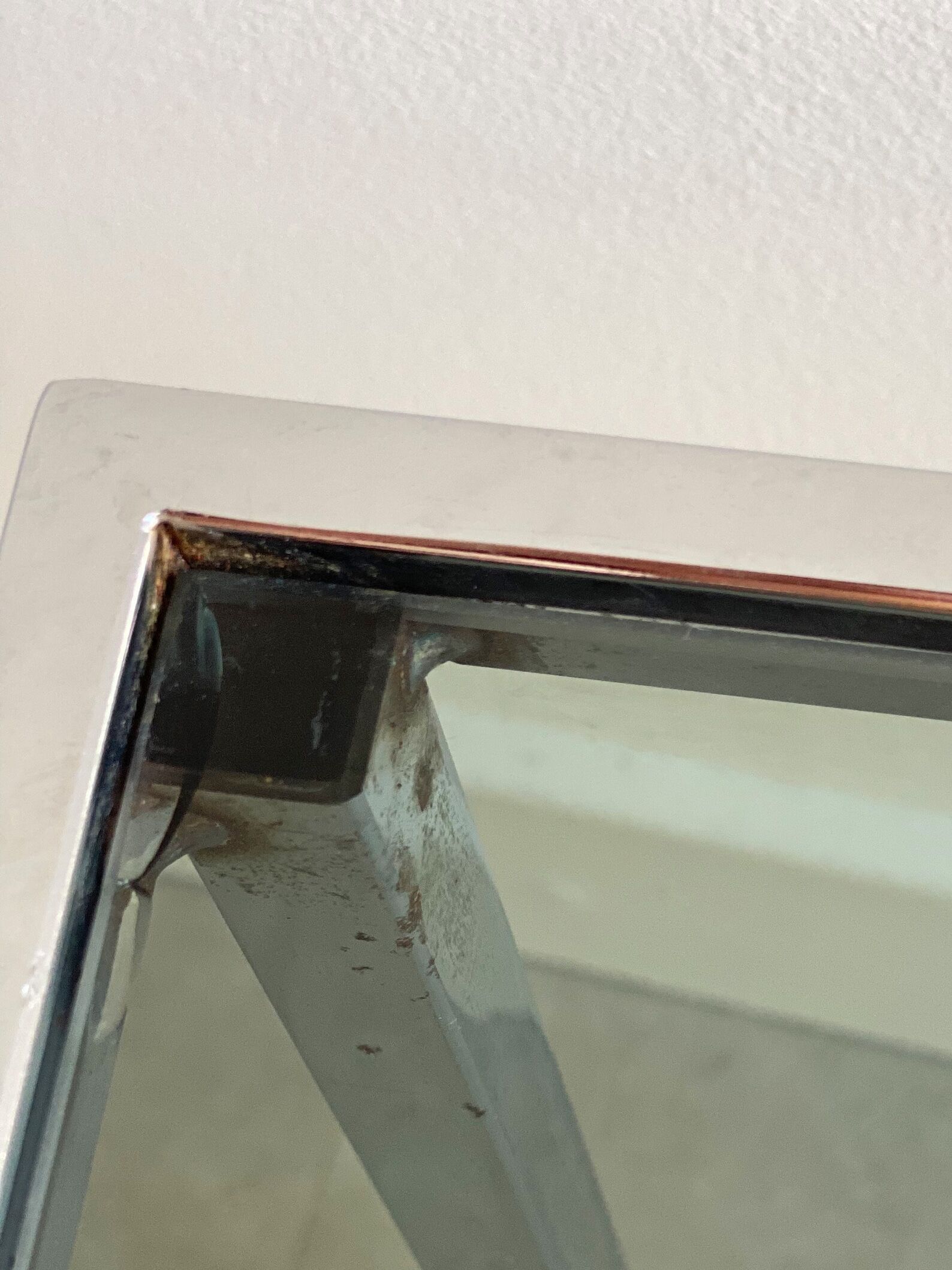 Vintage chrome side table with s smoked glass top