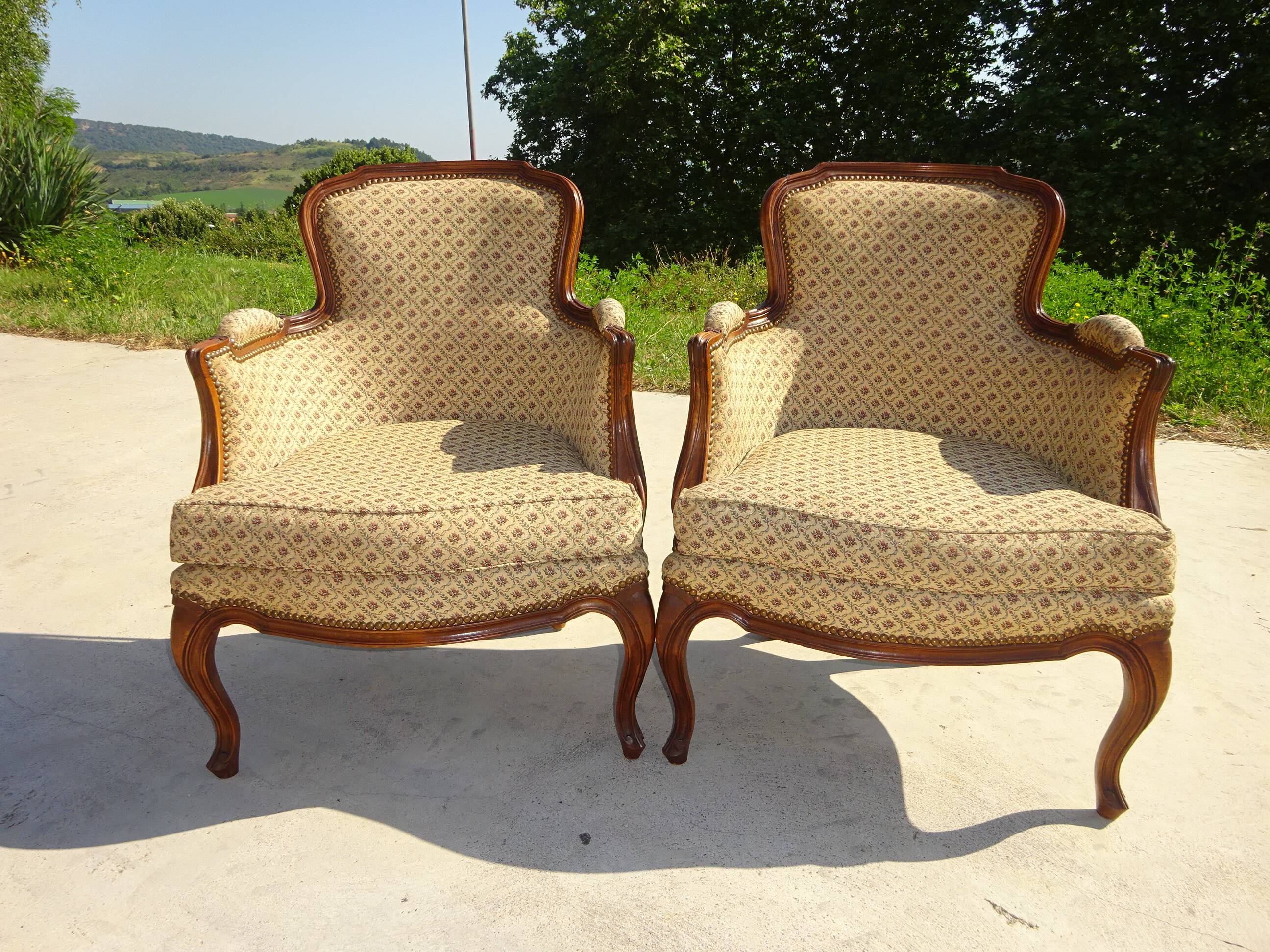 Bergère armchair in walnut and upholstered fabrics, set of 2