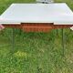 White Formica table with extensions and 2 designer chairs