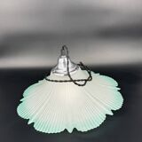 Frosted glass flower pendant with a water green edge.