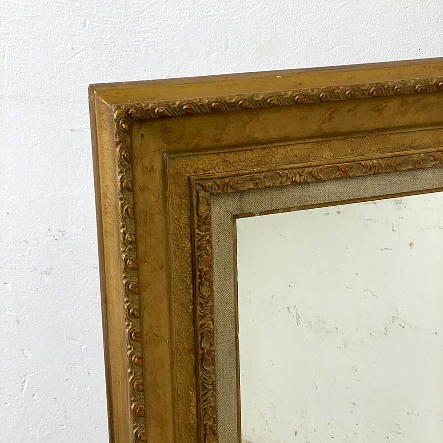 Louis XVI style wood and gilded stucco mirror