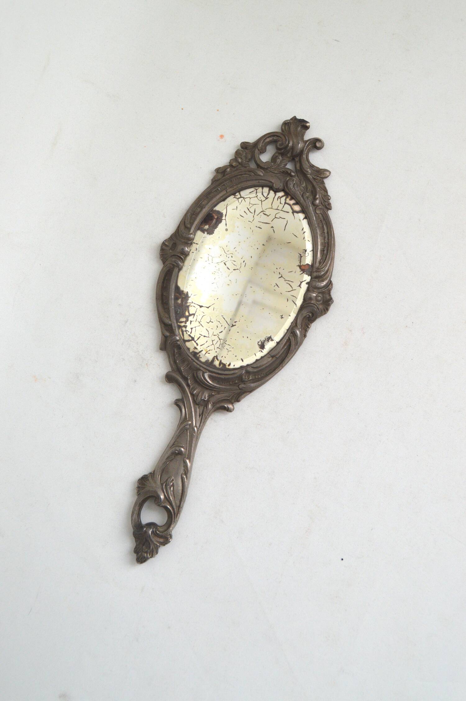 Pewter hand mirror