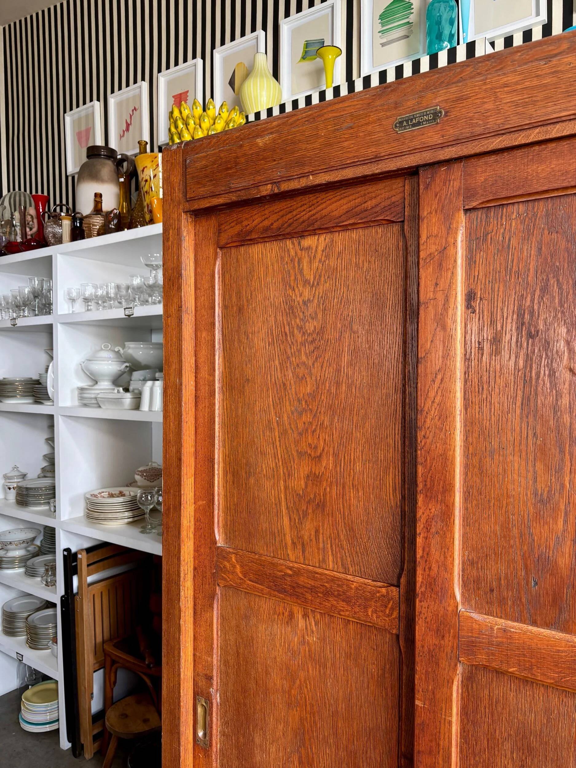 Dark wood sliding door wardrobe A. Lafond (Reims)