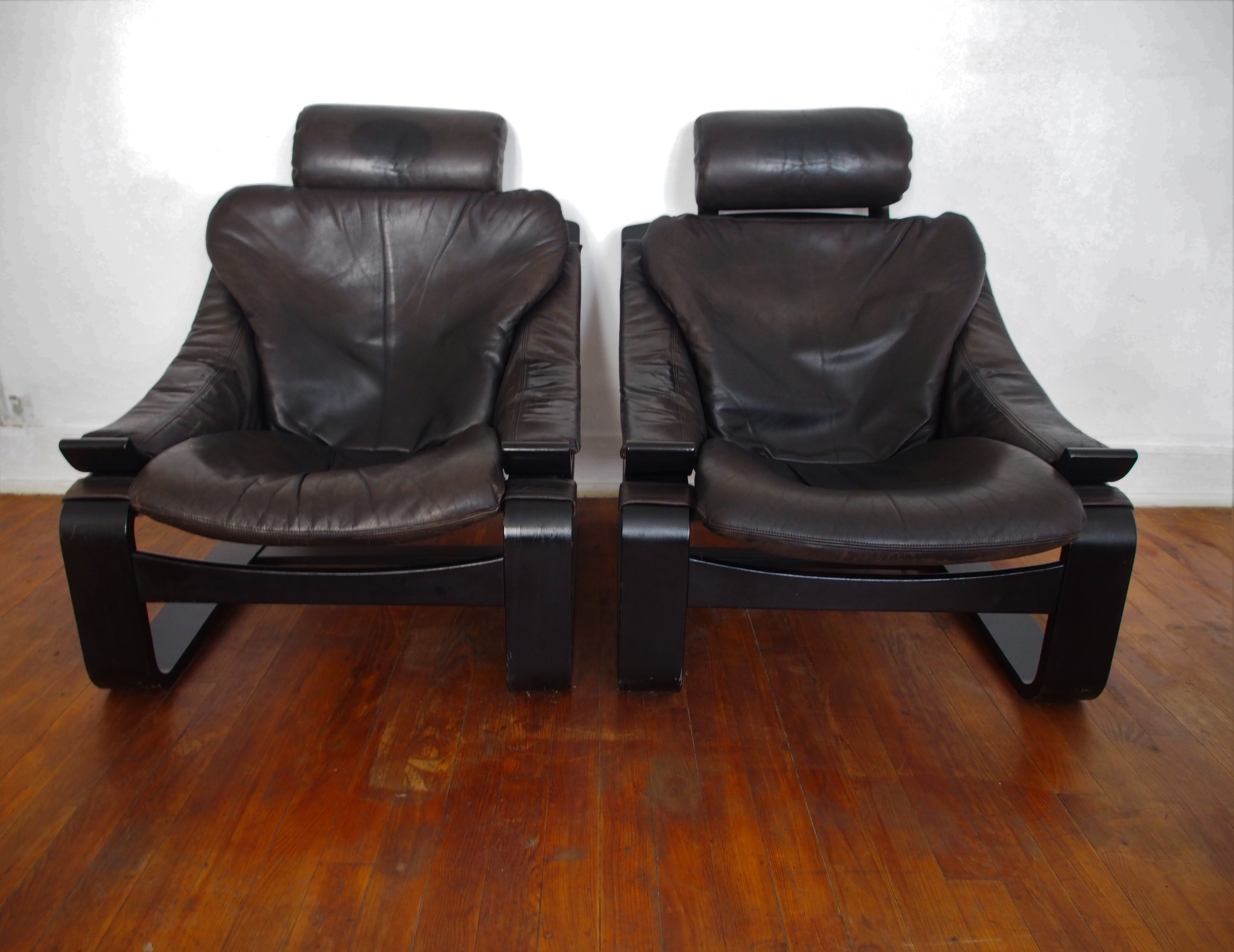 Pair of Scandinavian armchairs and footrests