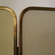 Vintage brass chimney firewall