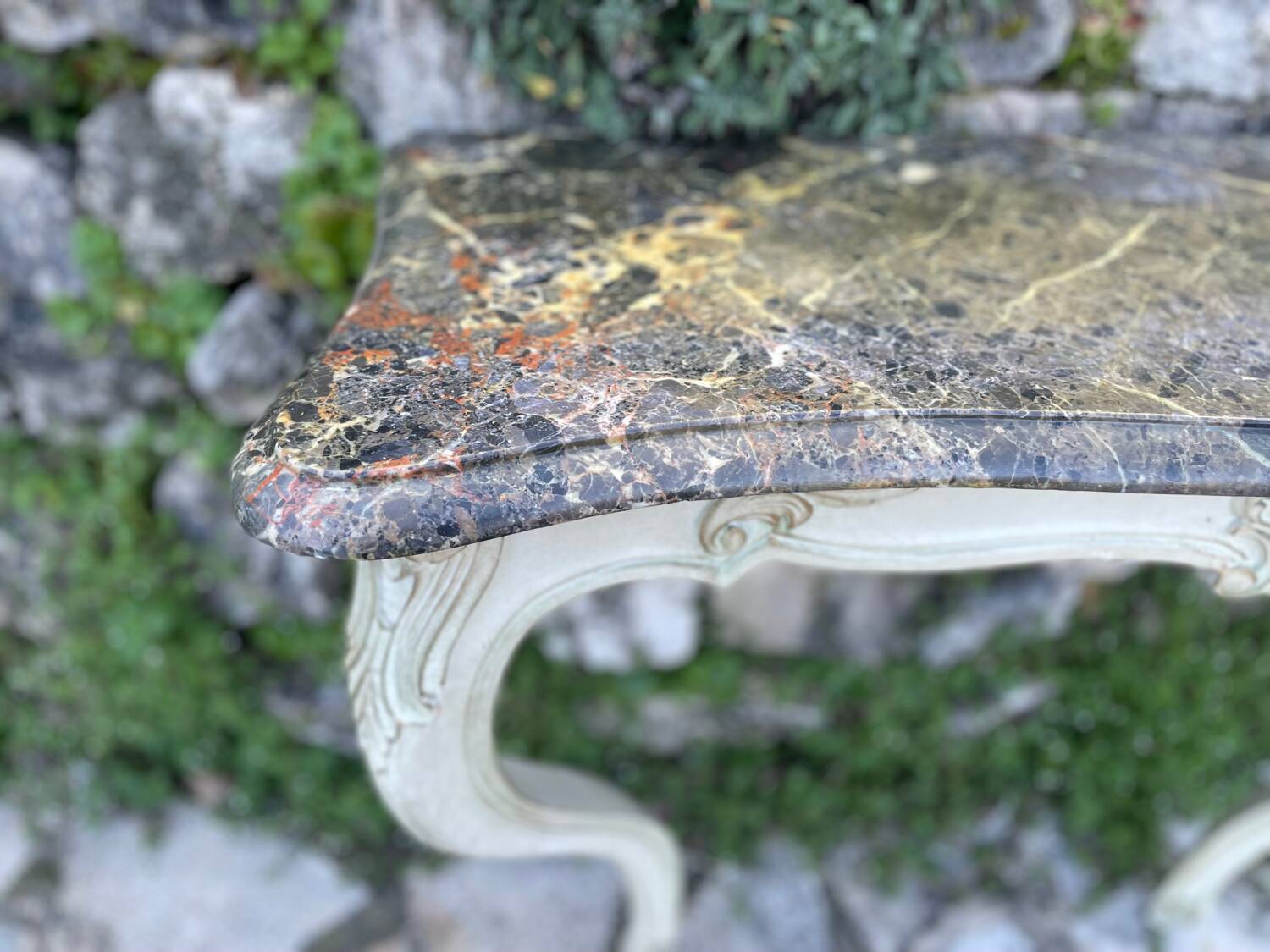 Wall console in painted, carved and molded wood in Louis XV style.