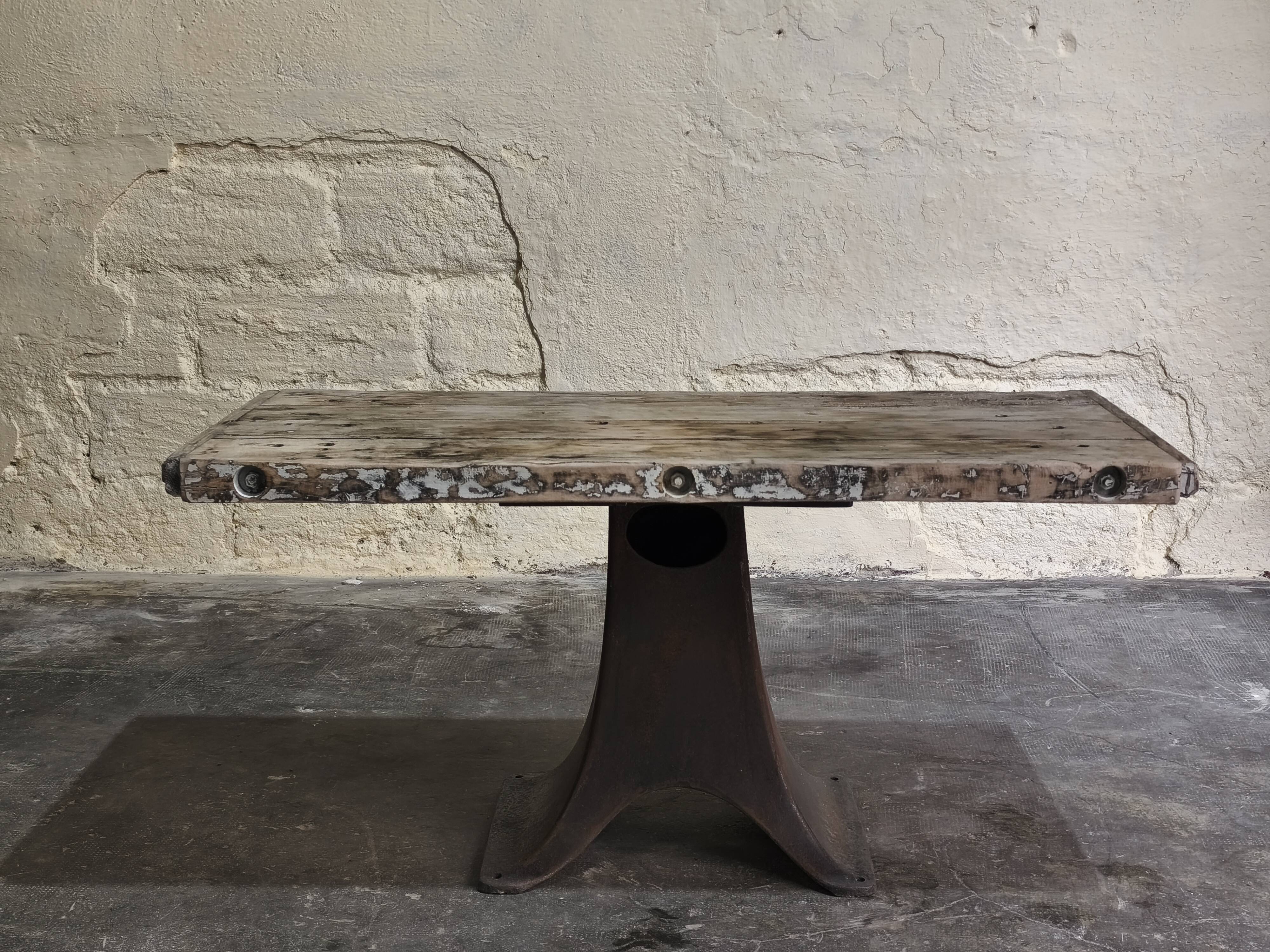 Solid oak coffee table with industrial cast iron legs