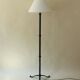 Neoclassical floor lamp in wrought iron