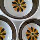 Set of three Italian deep plates from the 1970s, with ochre brown floral decoration.