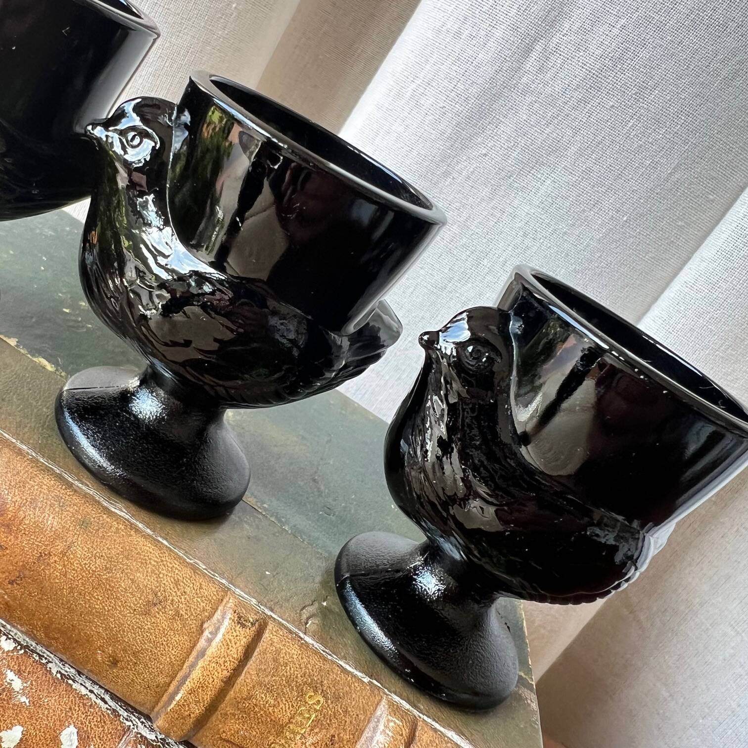 4 "hen" egg cups in black opaline