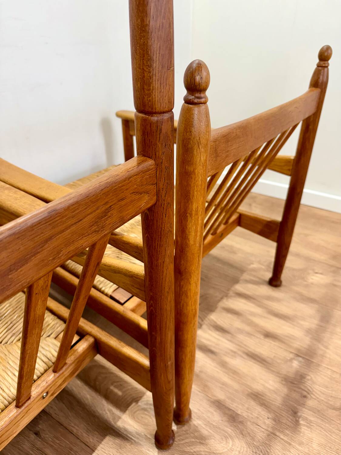 Pair of wooden and straw armchairs