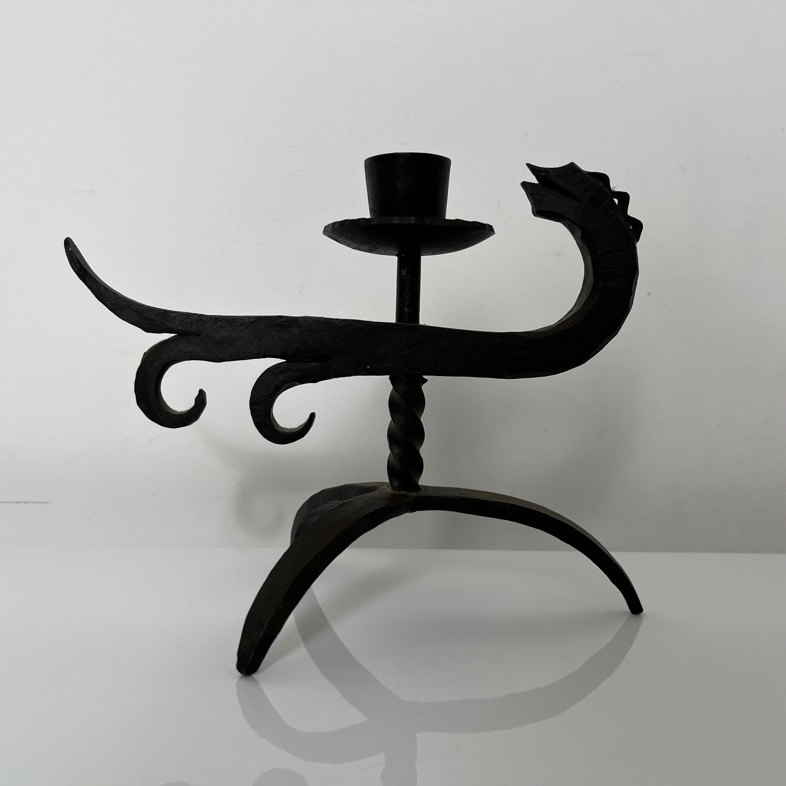 Zoomorphic dragon candle holder in wrought iron