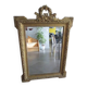 Large antique mirror in wood and gilded stucco.