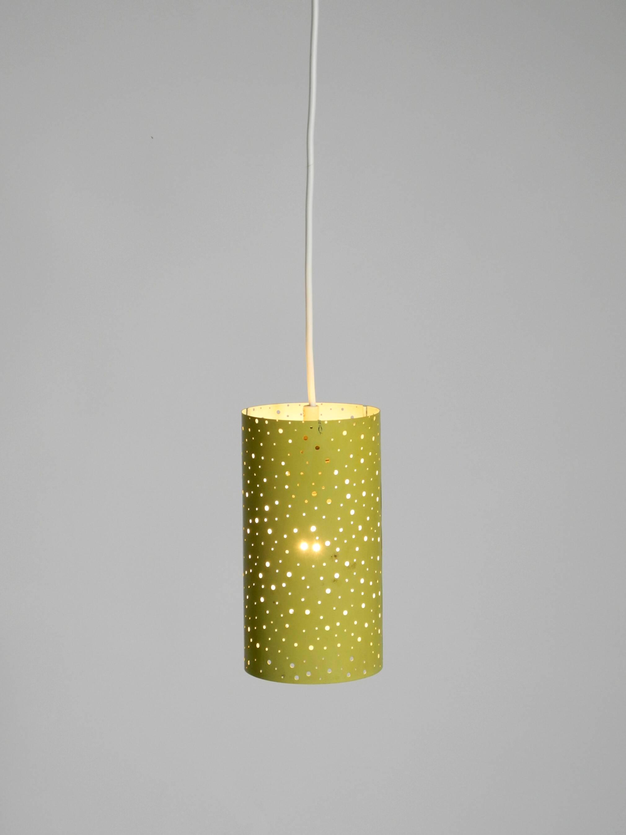 1950s pendant lamp in perforated metal, mustard yellow, by Ernest Igl