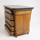 Chest of drawers in walnut and walnut veneer with black veined marble top