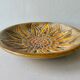 Enamelled ceramic dish, flower, Perigordine pottery, 60s