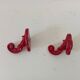 Pair of vintage wall hooks in enamelled cast iron.