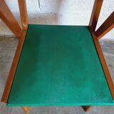 Fauteuil vintage en skai et bois années 60