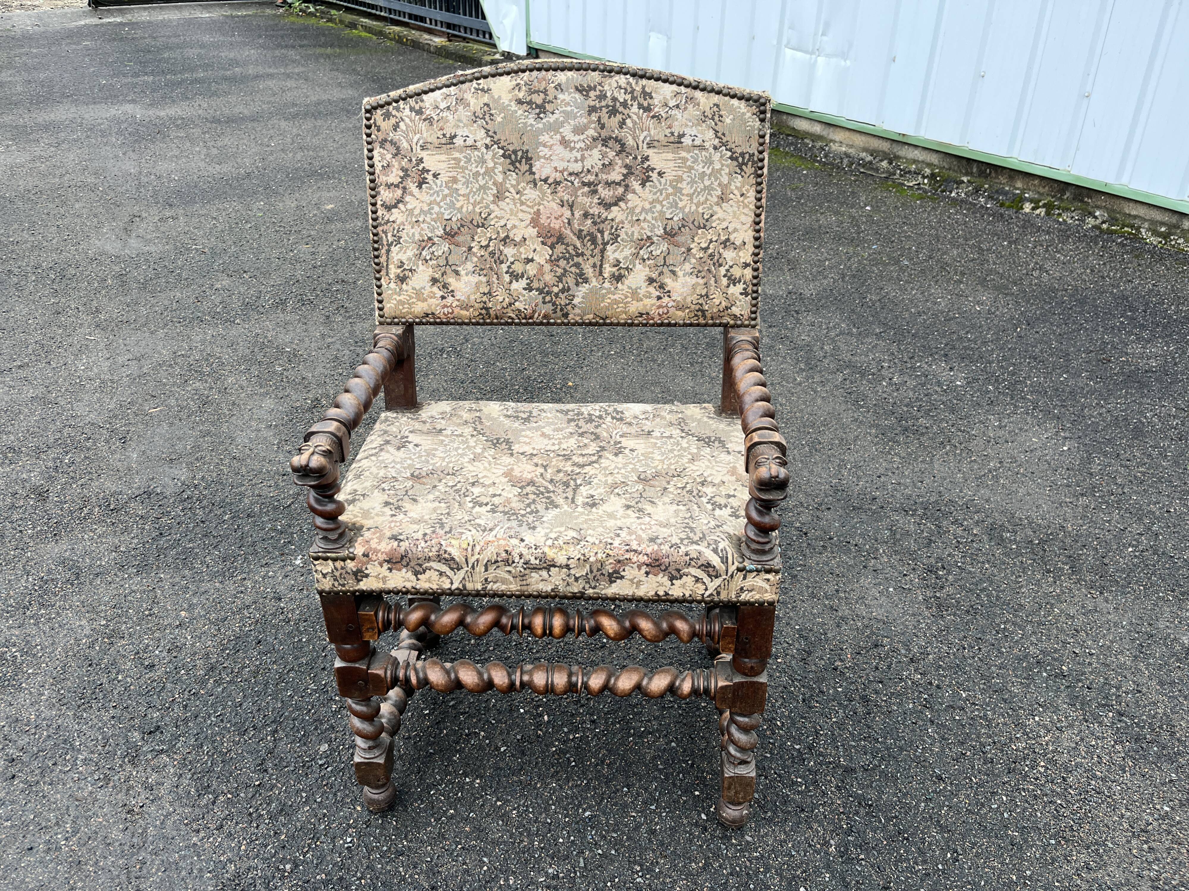 Louis XIII style armchair with twisted backrest and legs.