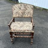 Louis XIII style armchair with twisted backrest and legs.