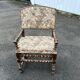 Louis XIII style armchair with twisted backrest and legs.
