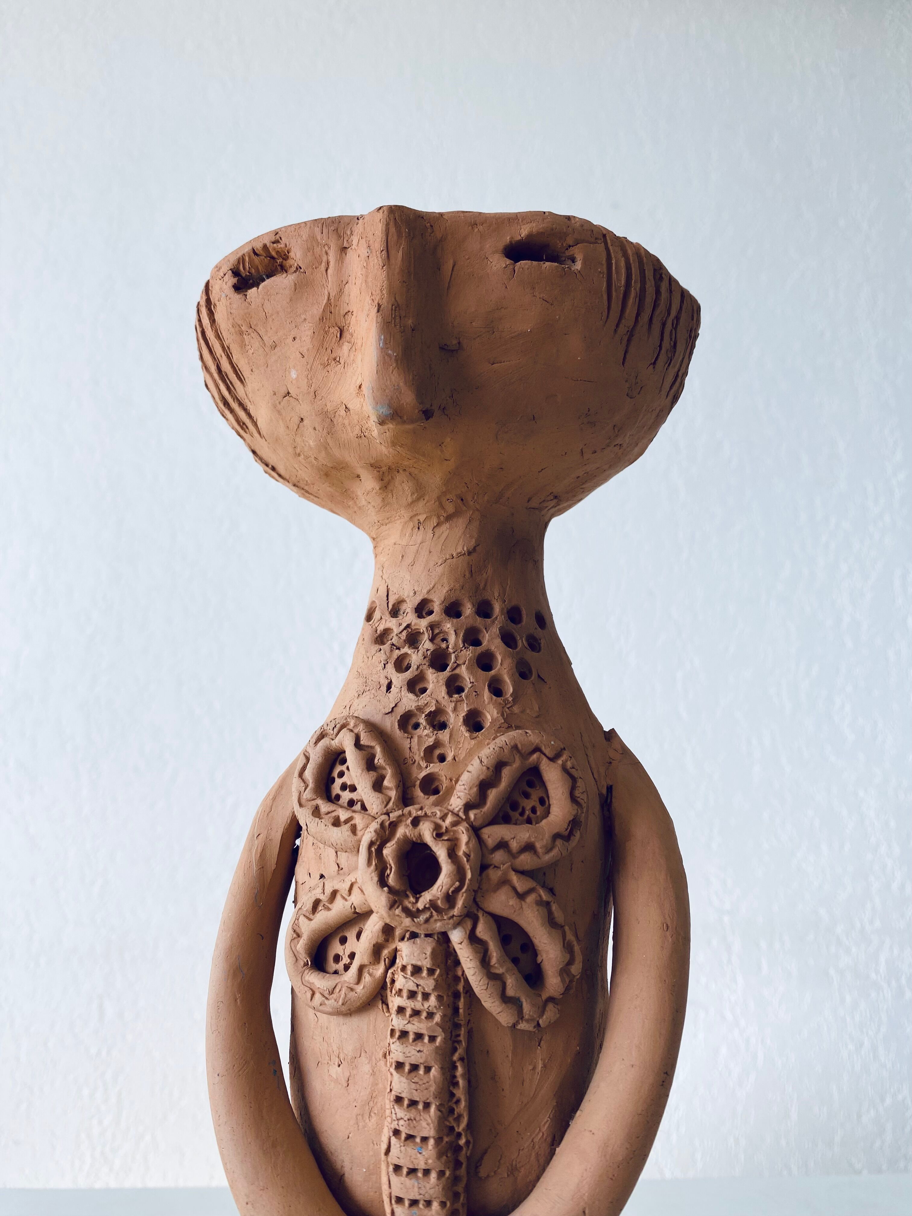 Terracotta personified vase