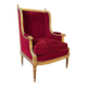 Golden wooden bergère in Louis XVI style upholstered in Bordeaux velvet.