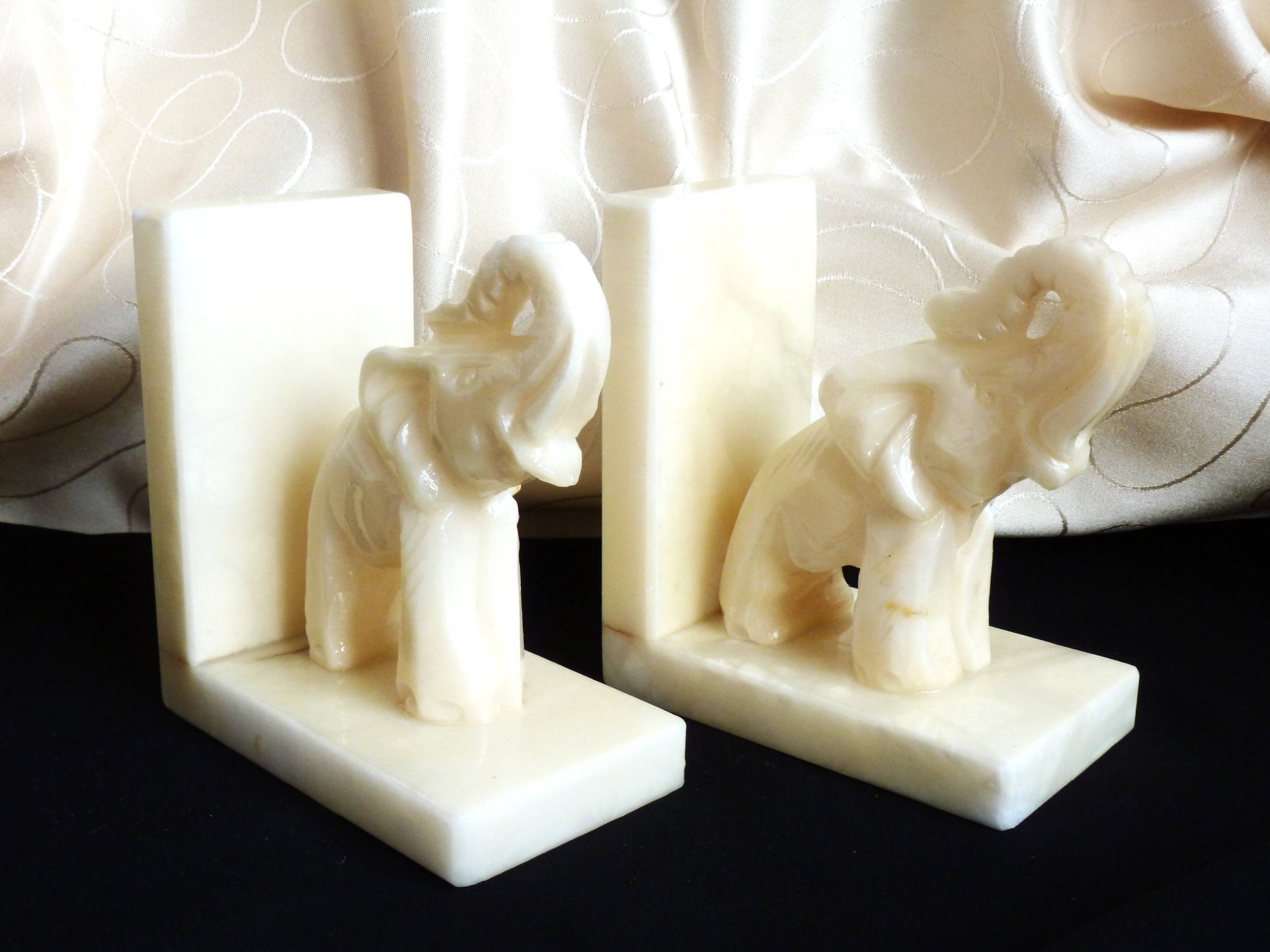 Pair of alabaster elephant bookends, library accessories