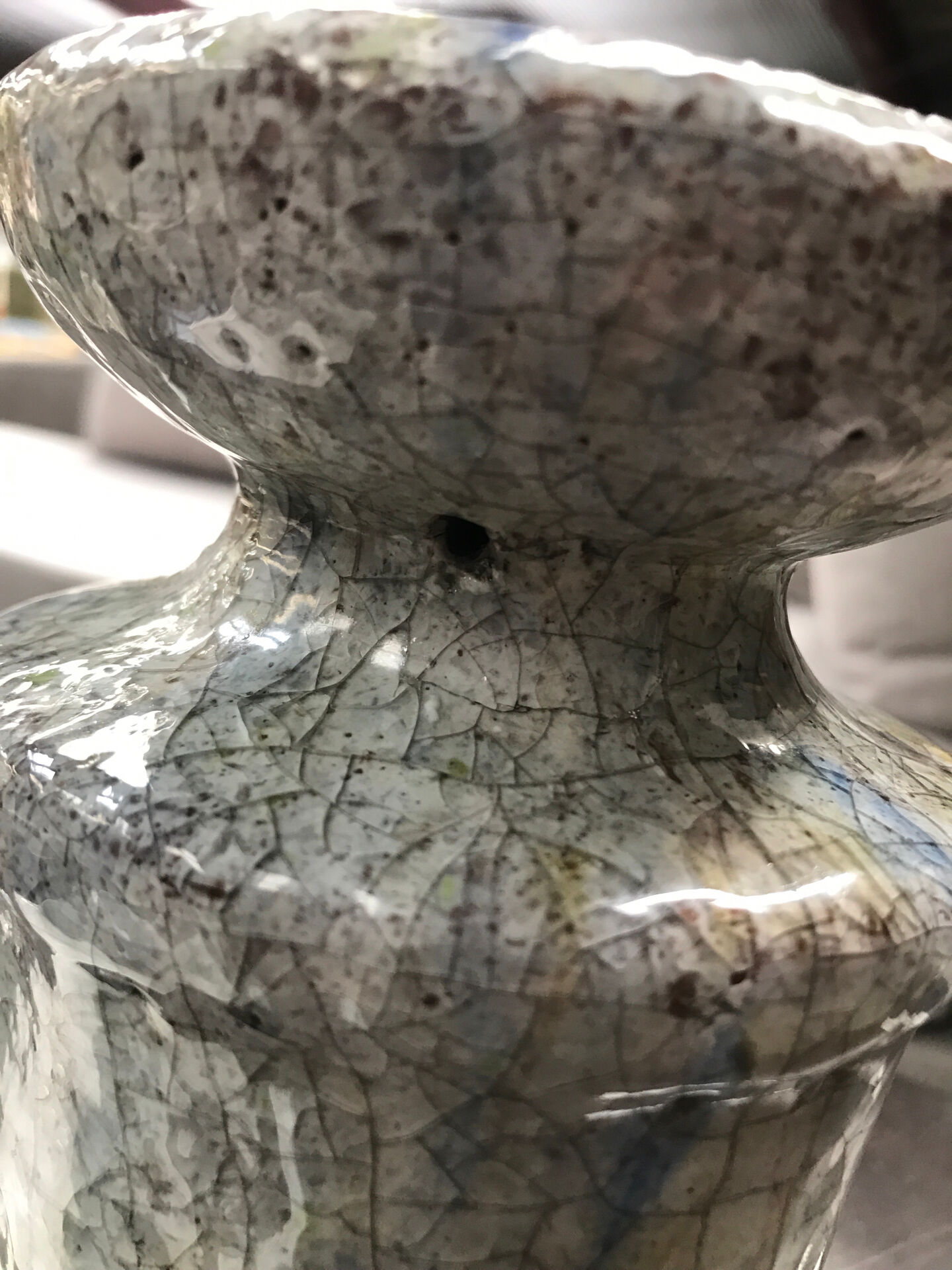 Ceramic candle holder in "Raku" style, blue-grey crackled.