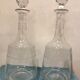 Pair of ancient carafes numbered Crystal Baccarat