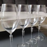 Set of 4 large red wine glasses. With a long twisted stem. Signed Schott Zwiesel. High 27 cm