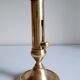 Golden brass candle holder