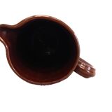 Large brown enamel pitcher
