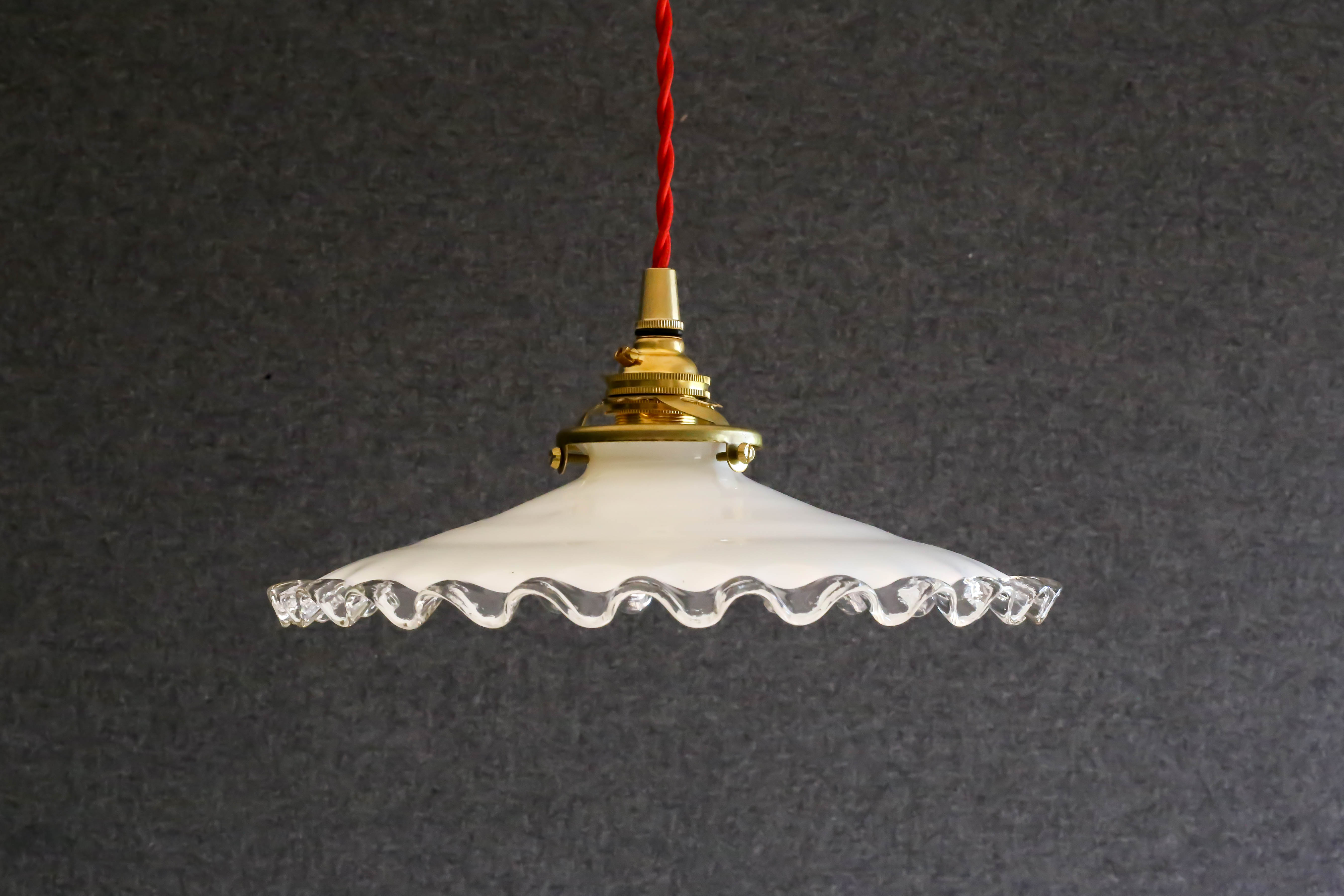White opaline pendant light with crenellated edges