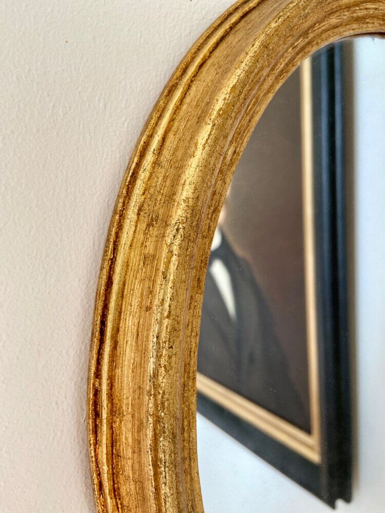 Gilded oval mirror 35 x 28 cm