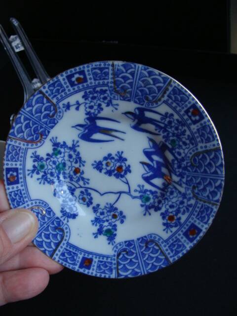 Asian Swallow Cup and Saucer